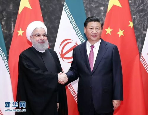 国家主席同伊朗总统鲁哈尼举行会谈